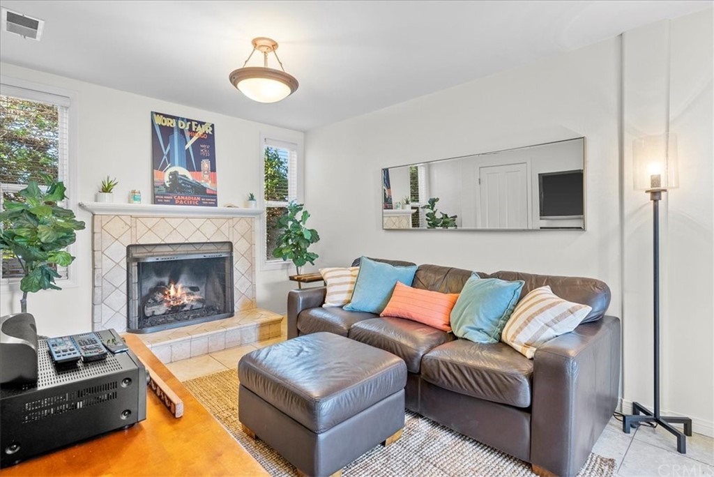 618 Ruby Street Redondo Beach, CA 90277 - Photo 20 of 50 a living room with furniture and a fireplace