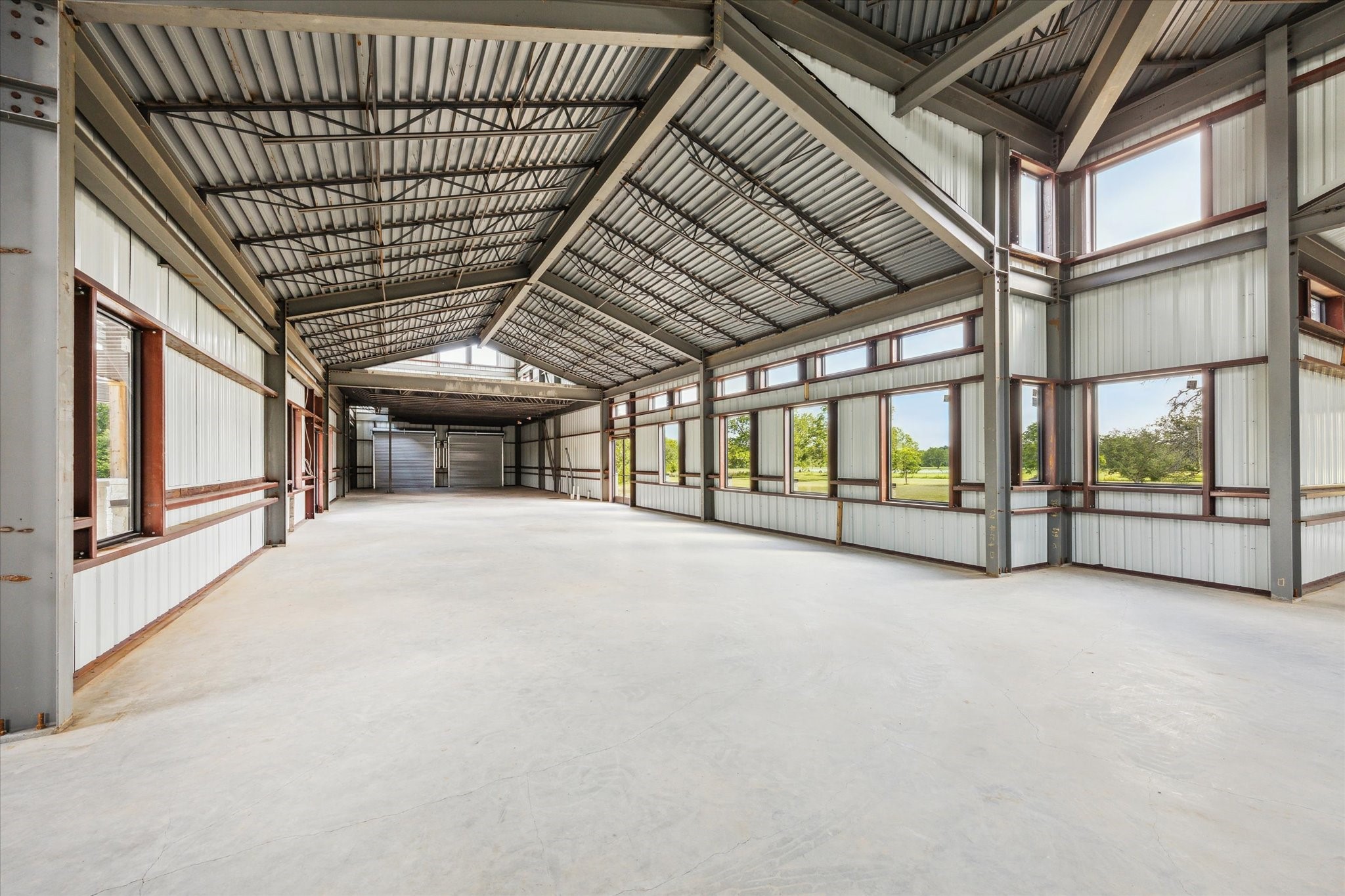 1286 Highway 237 Round Top, TX 78954 - Photo 17 of 24 Over the 2 garage doors is the 780 sf upstairs apartment.