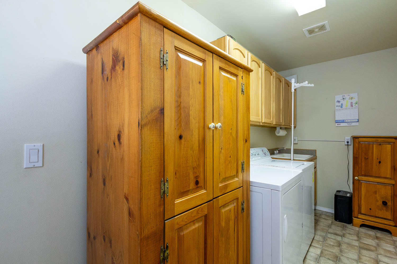 17151 Merced Road Bend, OR 97707 - Photo 15 of 30 a bathroom with a sink a mirror and a toilet