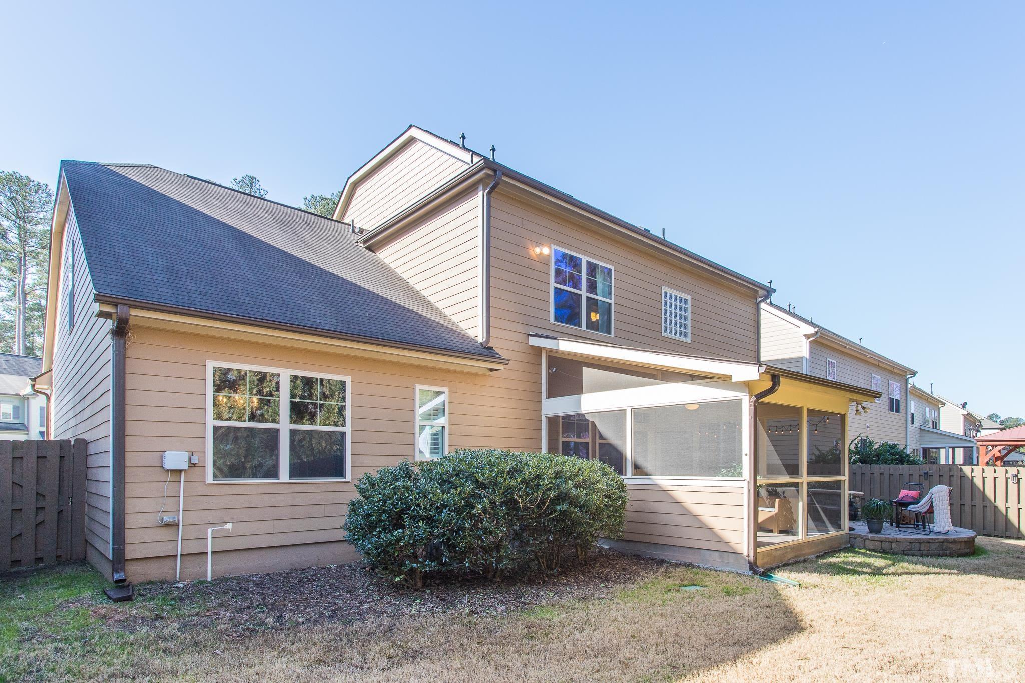 826 Wickham Ridge Road Apex, NC 27539 - Photo 39 of 47 a view of a house with a yard