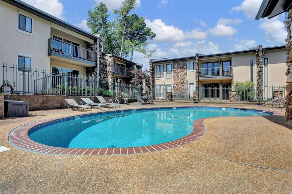 433 South Perkins Road, Unit 433 Memphis, TN 38117 - Photo 17 of 21 a view of pool with outdoor seating