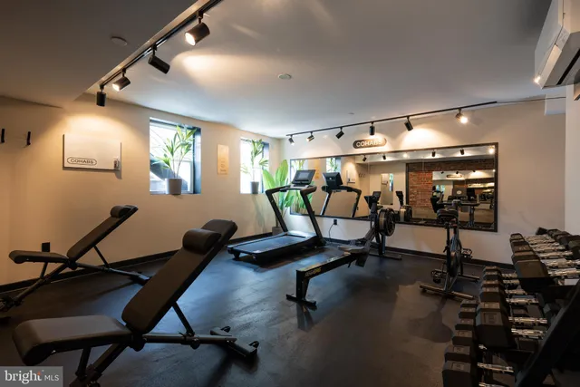 a view of a room with gym equipment