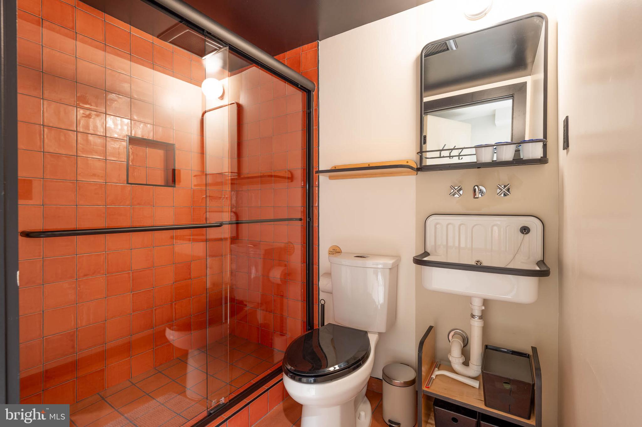 1480 Chapin Street Northwest, Unit 4 1 Washington, DC 20009 - Photo 18 of 23 a bathroom with a toilet and a shower