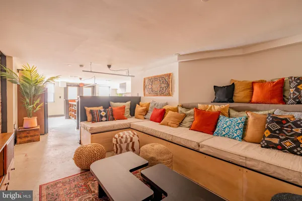 a living room with furniture and a couch