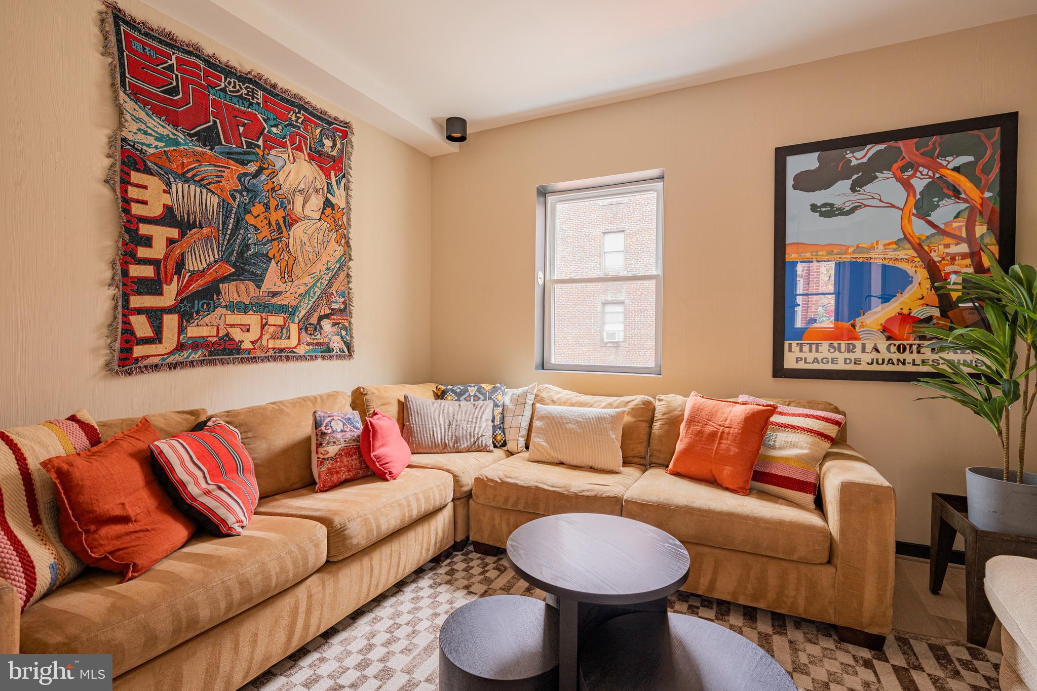 1480 Chapin Street Northwest, Unit 4 1 Washington, DC 20009 - Photo 9 of 23 a living room with furniture and a couch