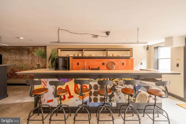 a black and white photo of a kitchen