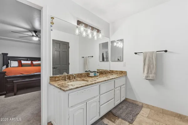 a view of livingroom with furniture and ceiling fan