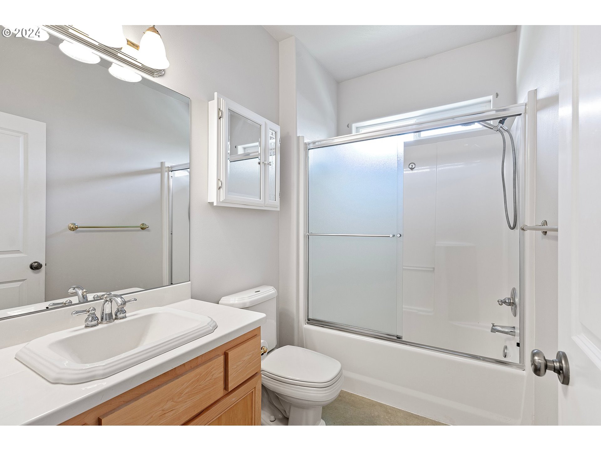 790 Old Orchard Lane Springfield, OR 97477 - Photo 26 of 46 a bathroom with a sink toilet and shower