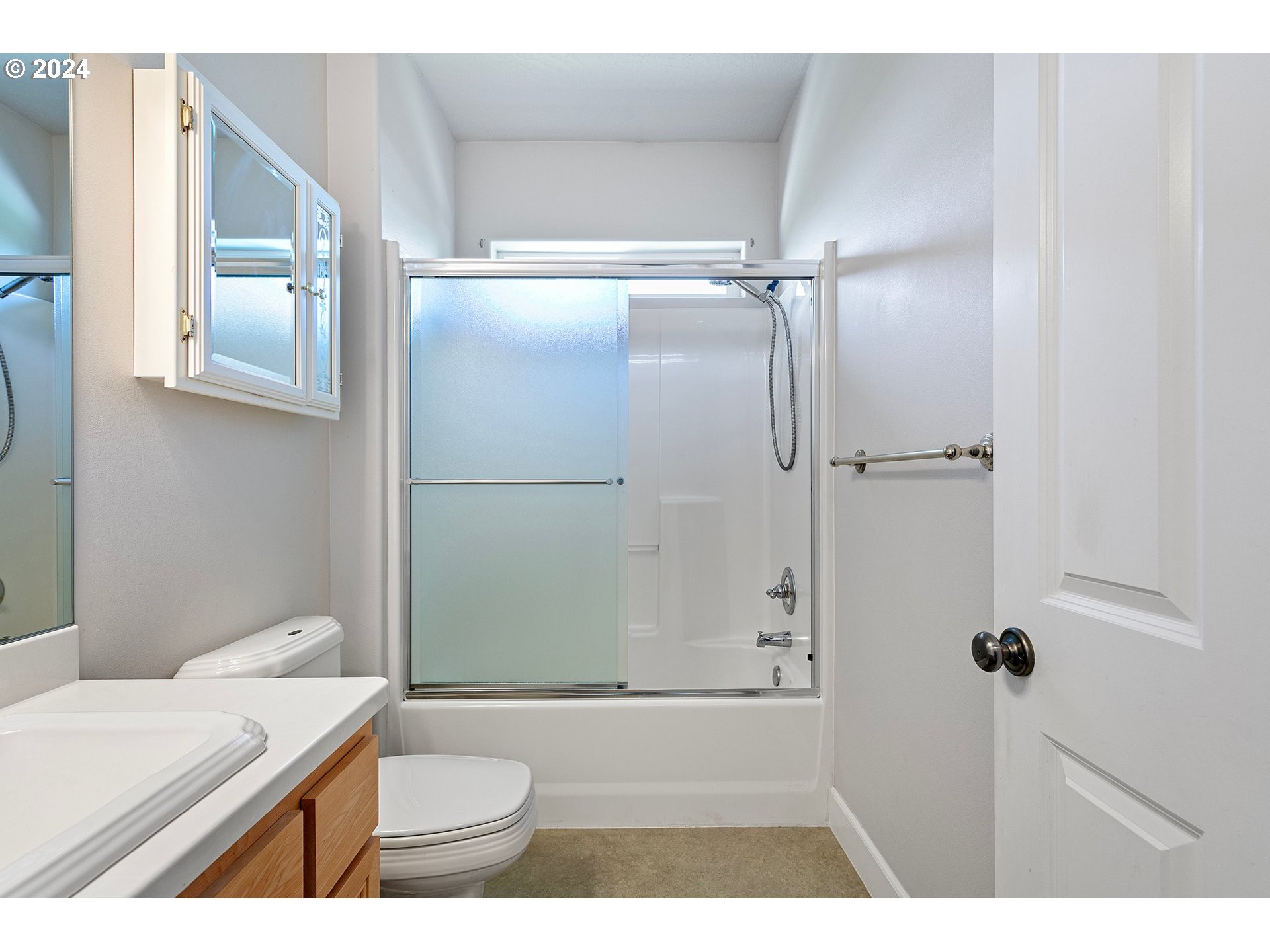 790 Old Orchard Lane Springfield, OR 97477 - Photo 27 of 46 a bathroom with a granite countertop sink toilet and shower