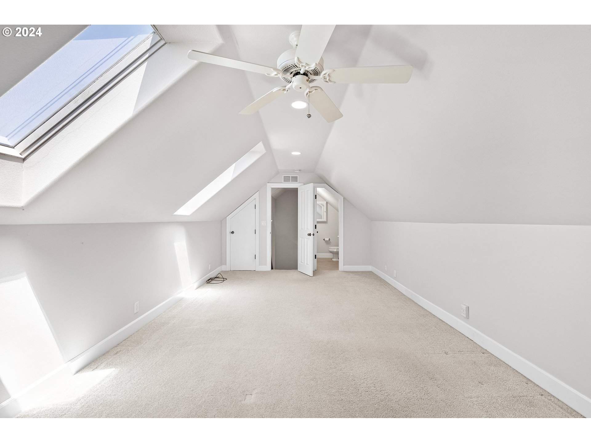 790 Old Orchard Lane Springfield, OR 97477 - Photo 39 of 46 a view of a livingroom with a ceiling fan and window