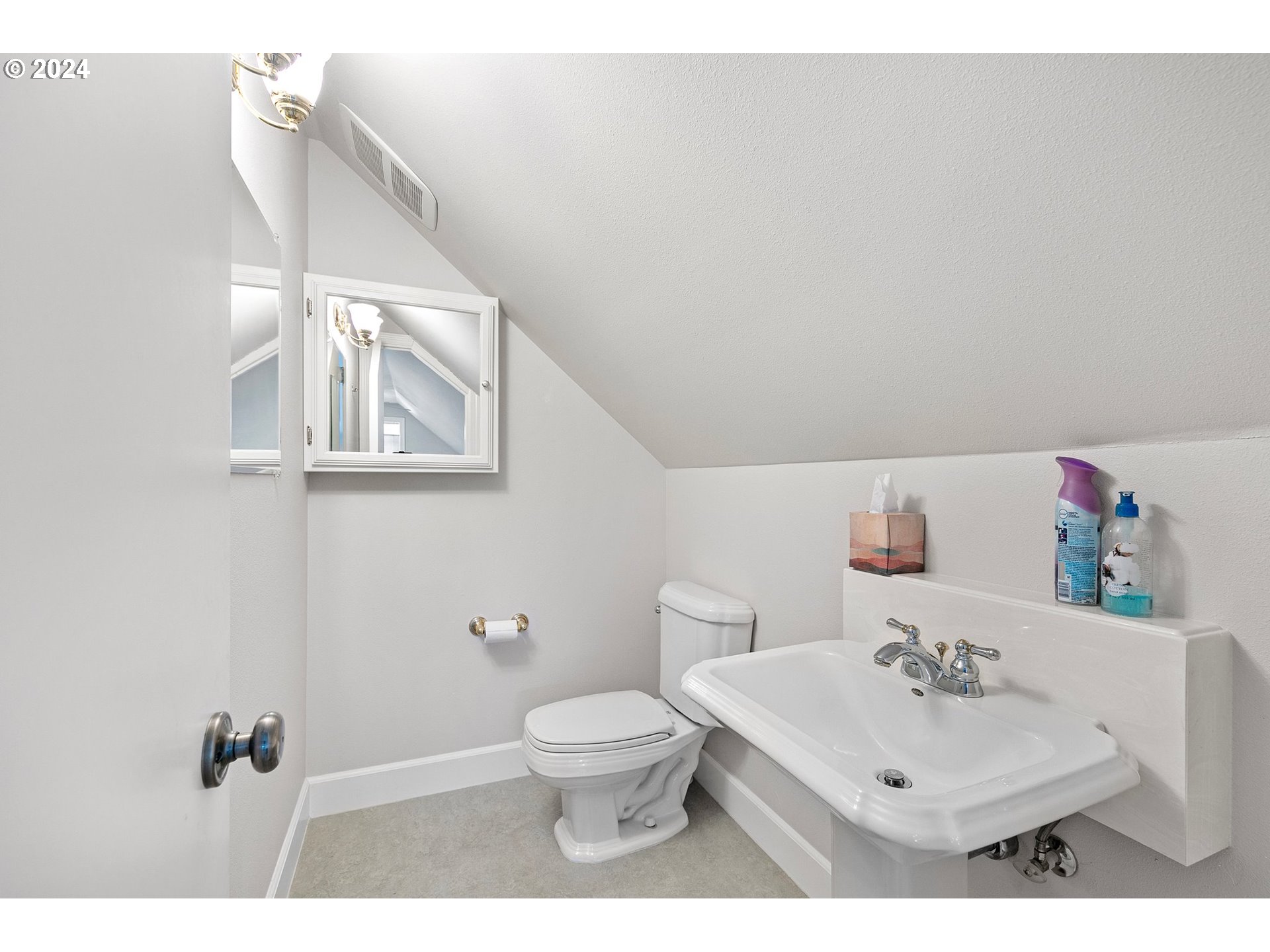 790 Old Orchard Lane Springfield, OR 97477 - Photo 40 of 46 a bathroom with a sink a toilet and a mirror