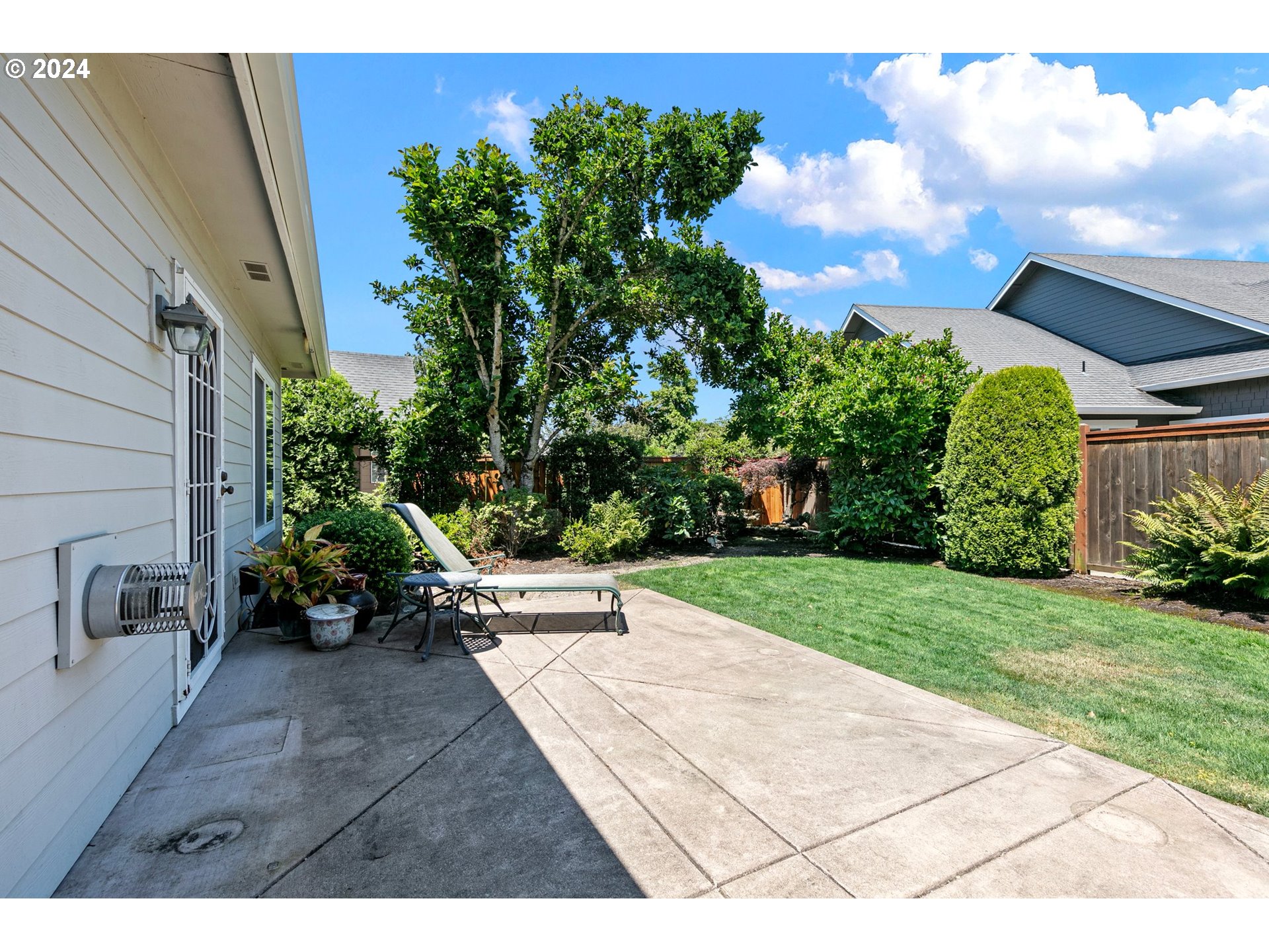 790 Old Orchard Lane Springfield, OR 97477 - Photo 41 of 46 a view of a backyard with sitting area