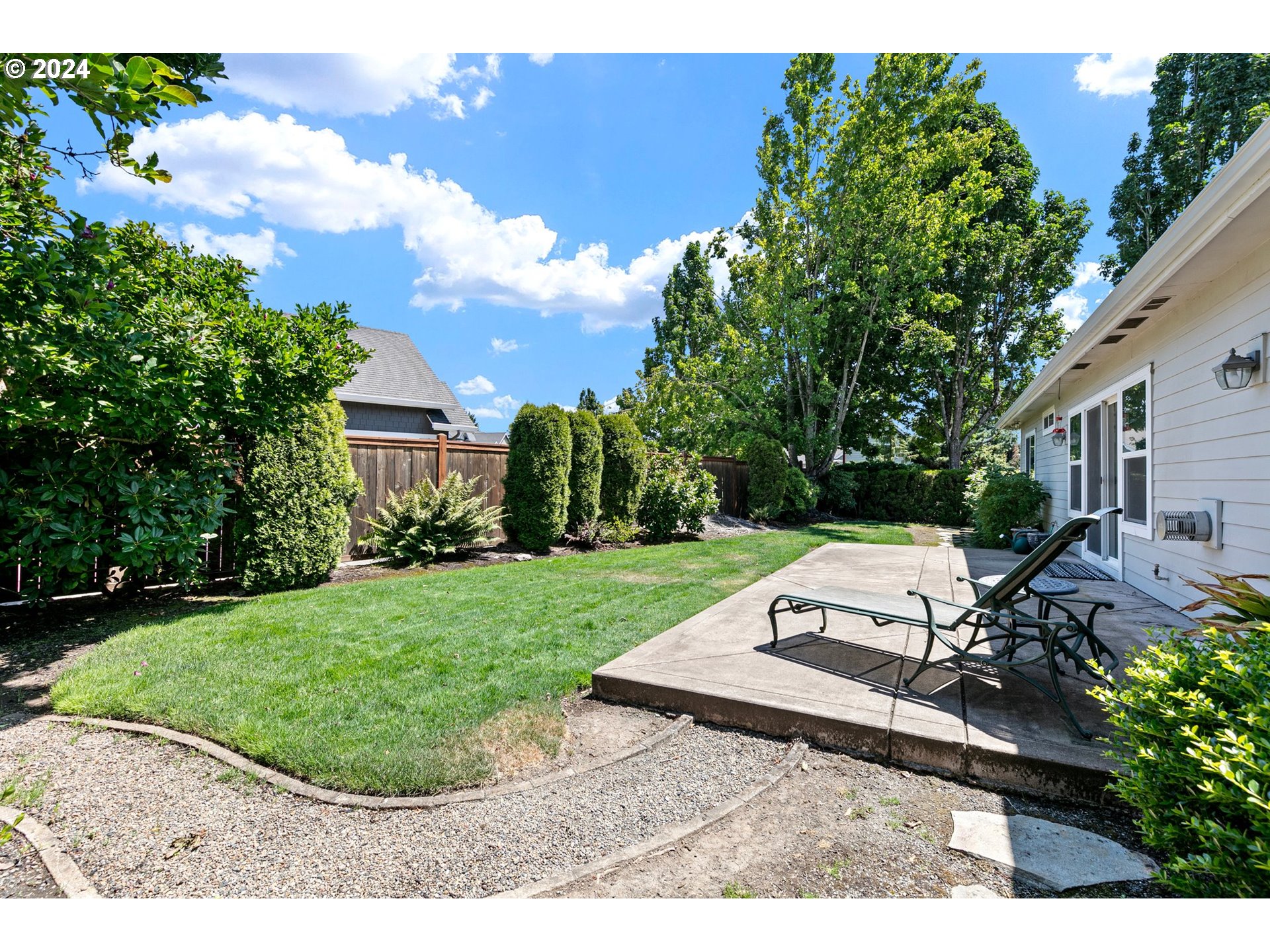 790 Old Orchard Lane Springfield, OR 97477 - Photo 42 of 46 a view of a backyard with sitting area