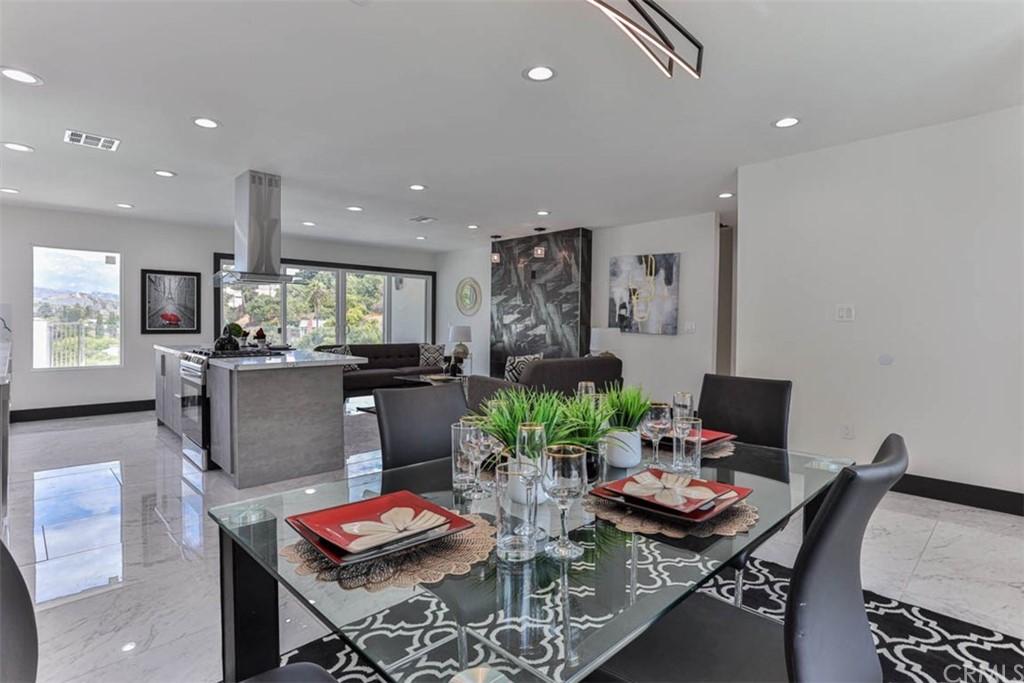 945 Oban Drive Los Angeles, CA 90065 - Photo 20 of 60 a living room with furniture and a table