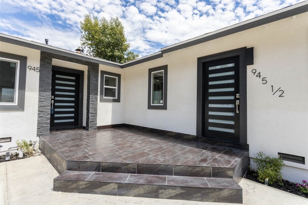 945 Oban Drive Los Angeles, CA 90065 - Photo 23 of 60 a view of a house with a yard