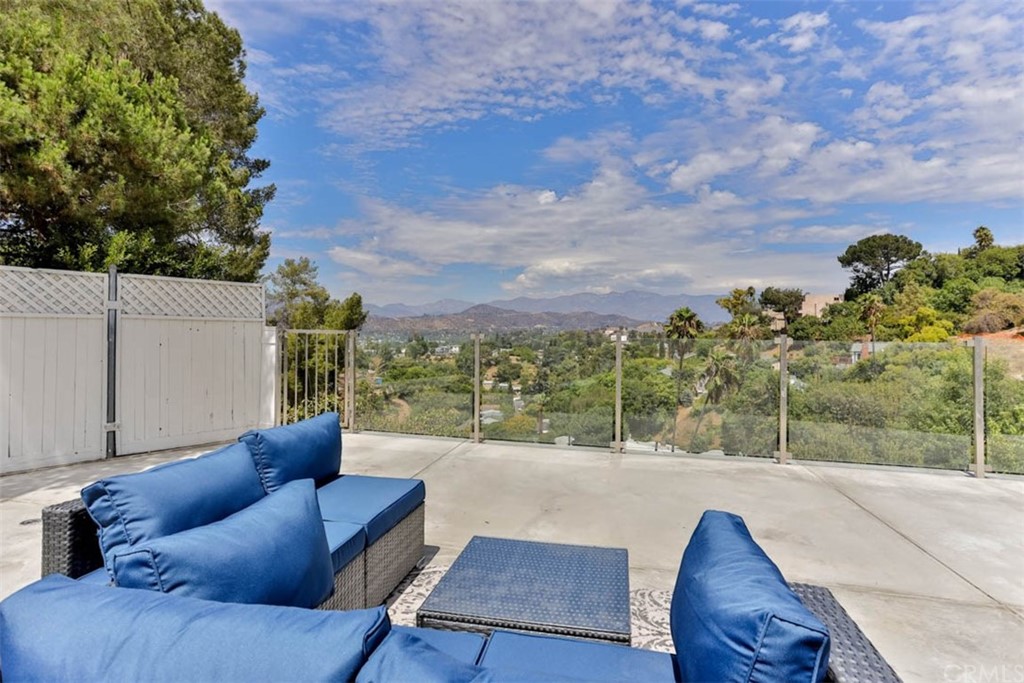 945 Oban Drive Los Angeles, CA 90065 - Photo 3 of 60 a view of a terrace with couches and sky view