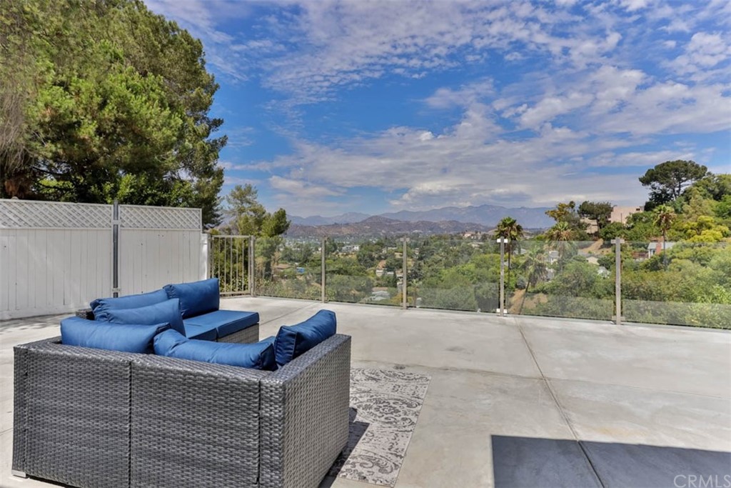 945 Oban Drive Los Angeles, CA 90065 - Photo 4 of 60 a view of terrace with seating space and trees