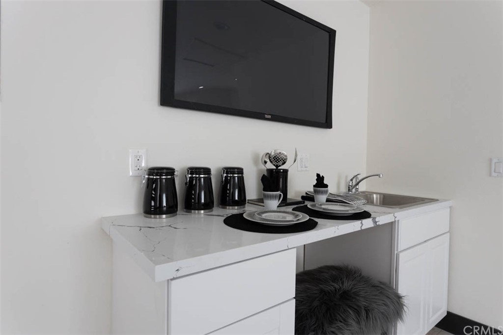 945 Oban Drive Los Angeles, CA 90065 - Photo 41 of 60 a kitchen with a stove and a microwave