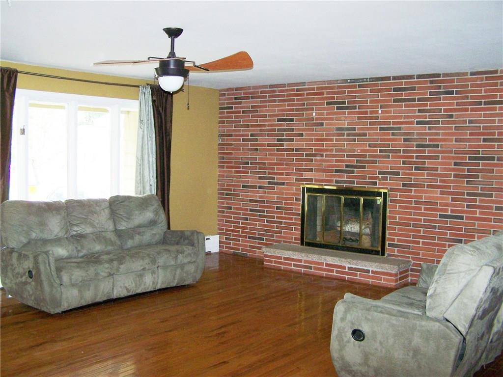 6 Smith Road Springvale, ME 04083 - Photo 3 of 15 Living room wood burning fireplace. ...