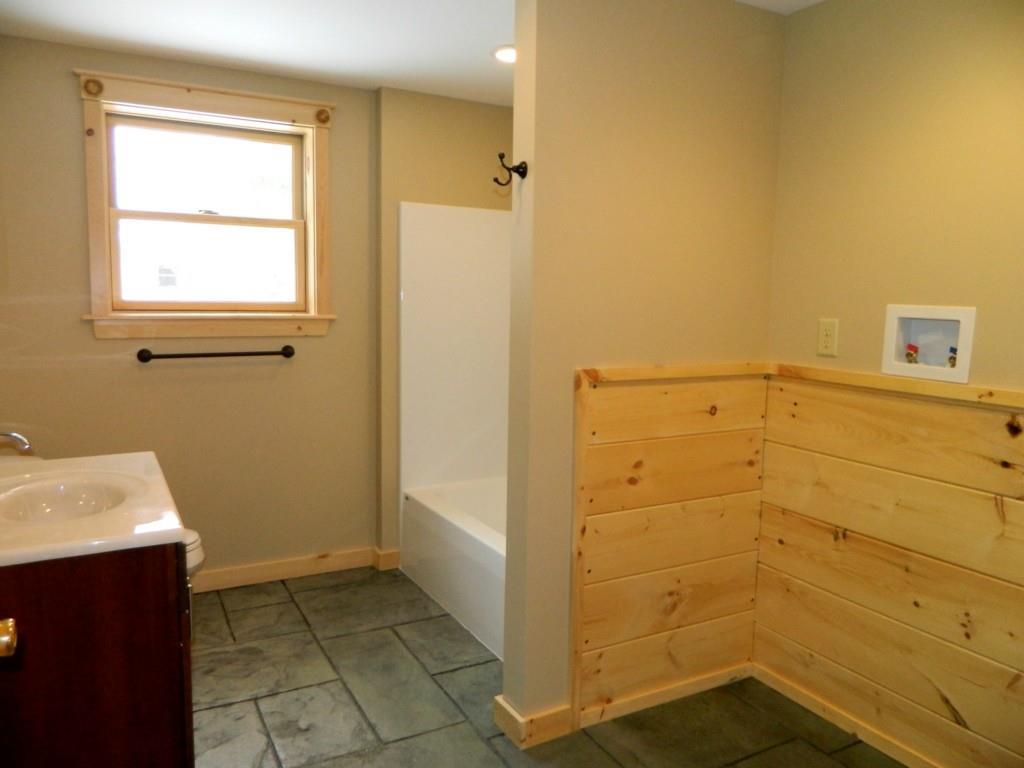 7 Spur Road Bethel, ME 04217 - Photo 21 of 25 Full bath with laundry hookup on the...