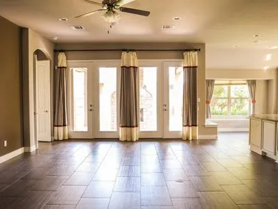 a view of an entryway with wooden floor