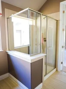 a bathroom with a shower and a sink