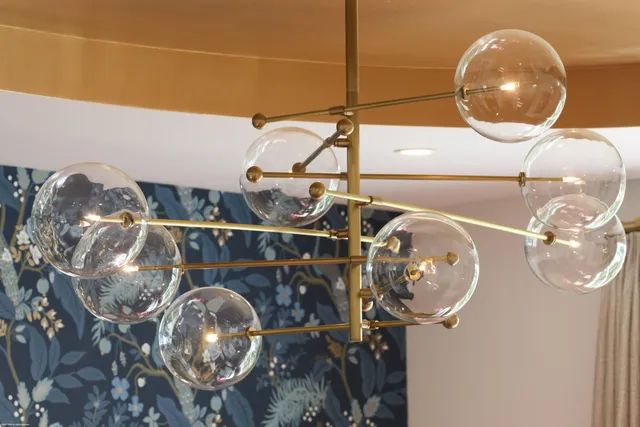 a kitchen with stainless steel appliances granite countertop wooden cabinets and a stove