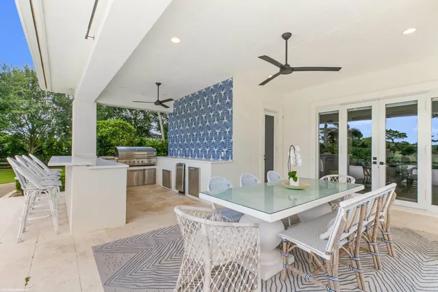 a living room with furniture rug and wooden floor