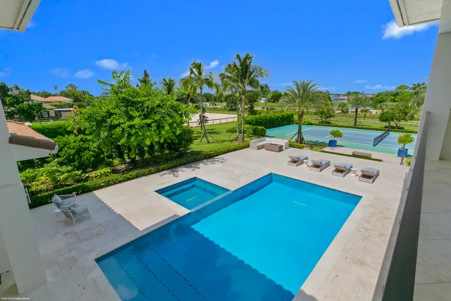 a view of a house with a swimming pool