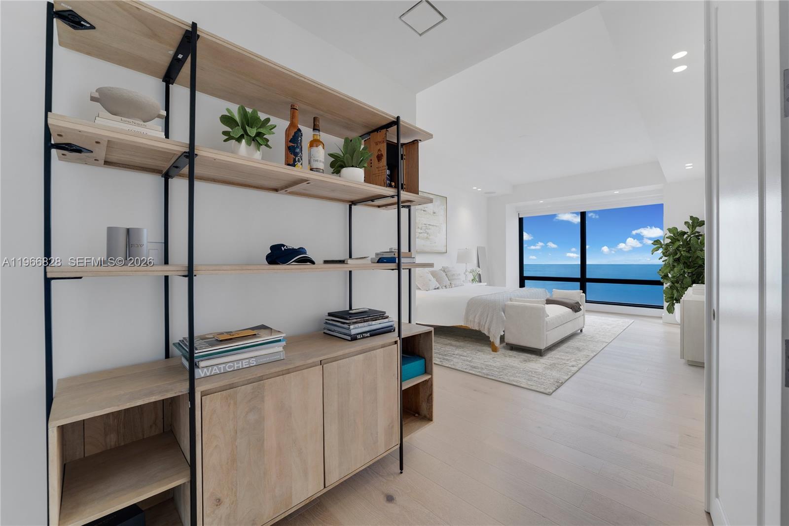 1425 Brickell Avenue, Unit 57A Miami, FL 33131 - Photo 12 of 35 a view of living room with furniture and floor to ceiling window