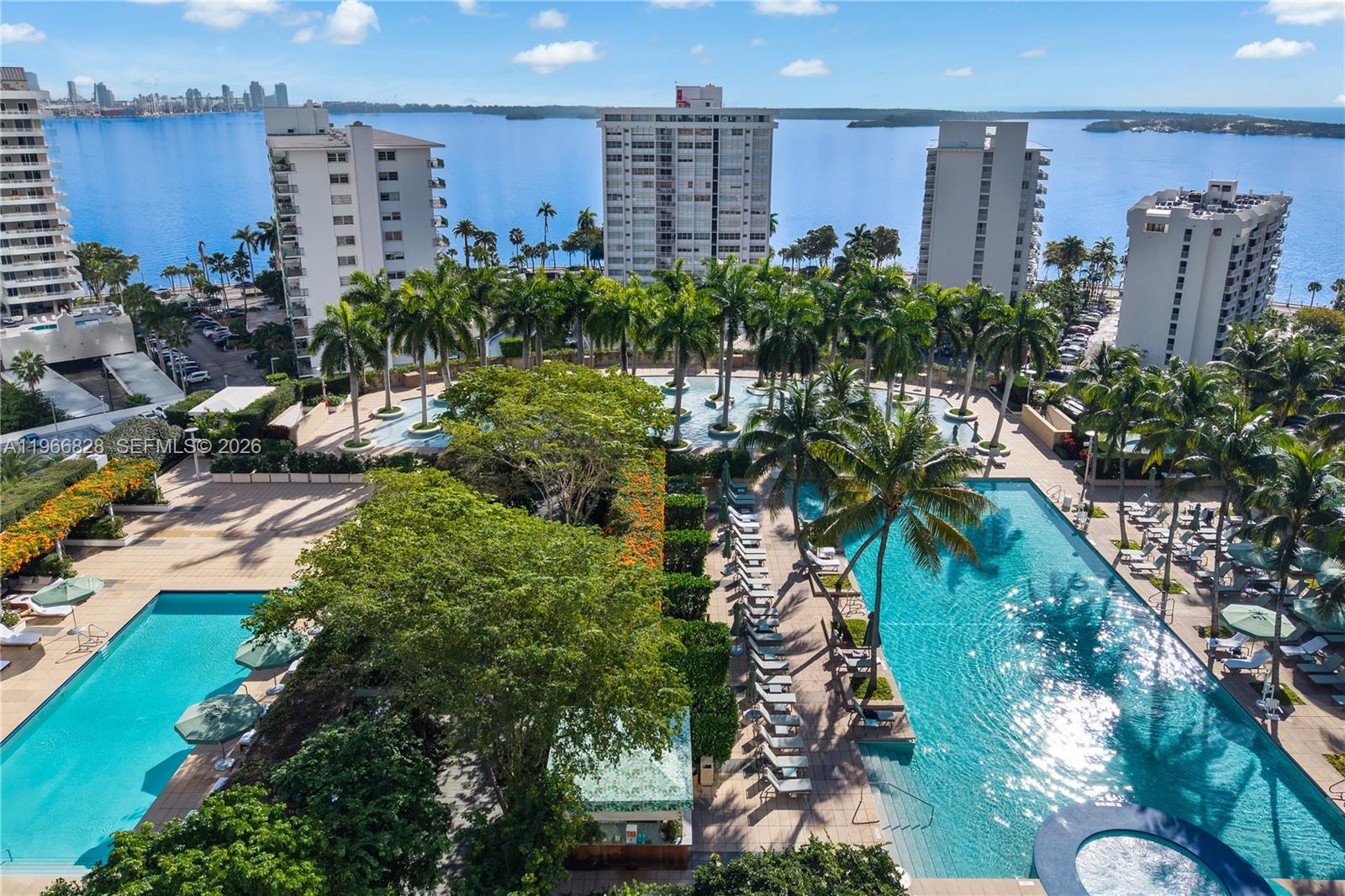 1425 Brickell Avenue, Unit 57A Miami, FL 33131 - Photo 33 of 35 a view of a multi story building with a yard