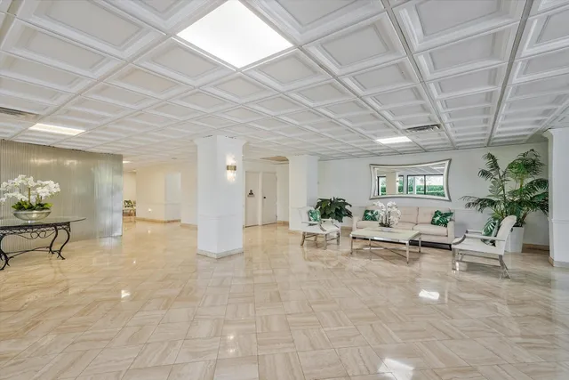 a dining room with a table and chairs