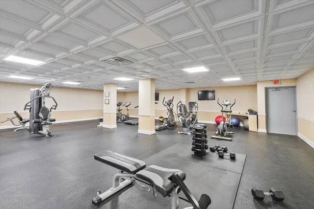 a view of a swimming pool with a yard