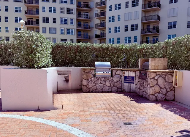 a view of a swimming pool and an outdoor space