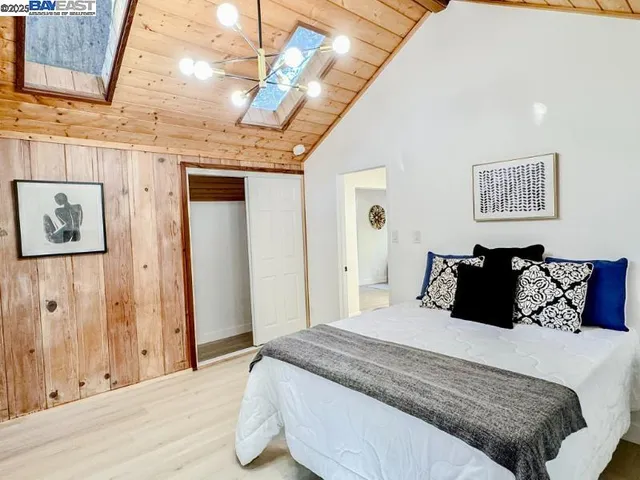 a kitchen with a sink and large window