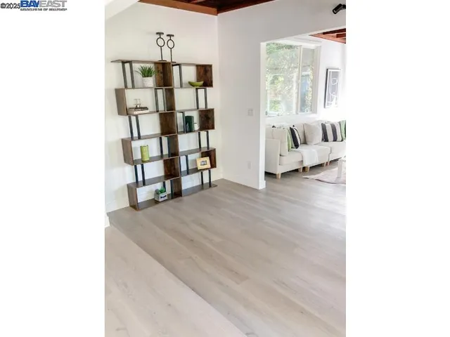 a white toilet sitting next to a white sink