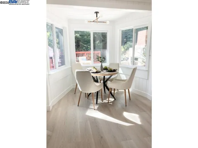a bathroom with a sink a mirror and a shower