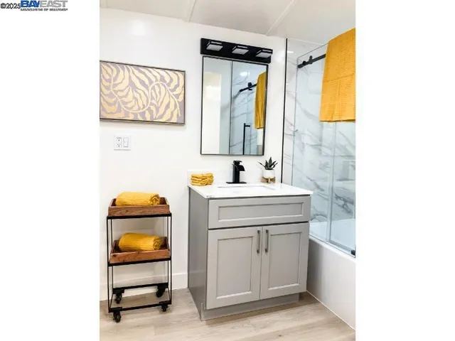 a kitchen with a sink and a washer