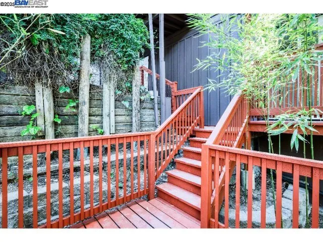 a view of wooden balcony with outdoor seating