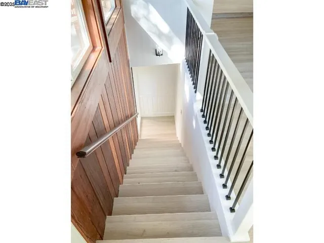a view of a dining room with furniture and window