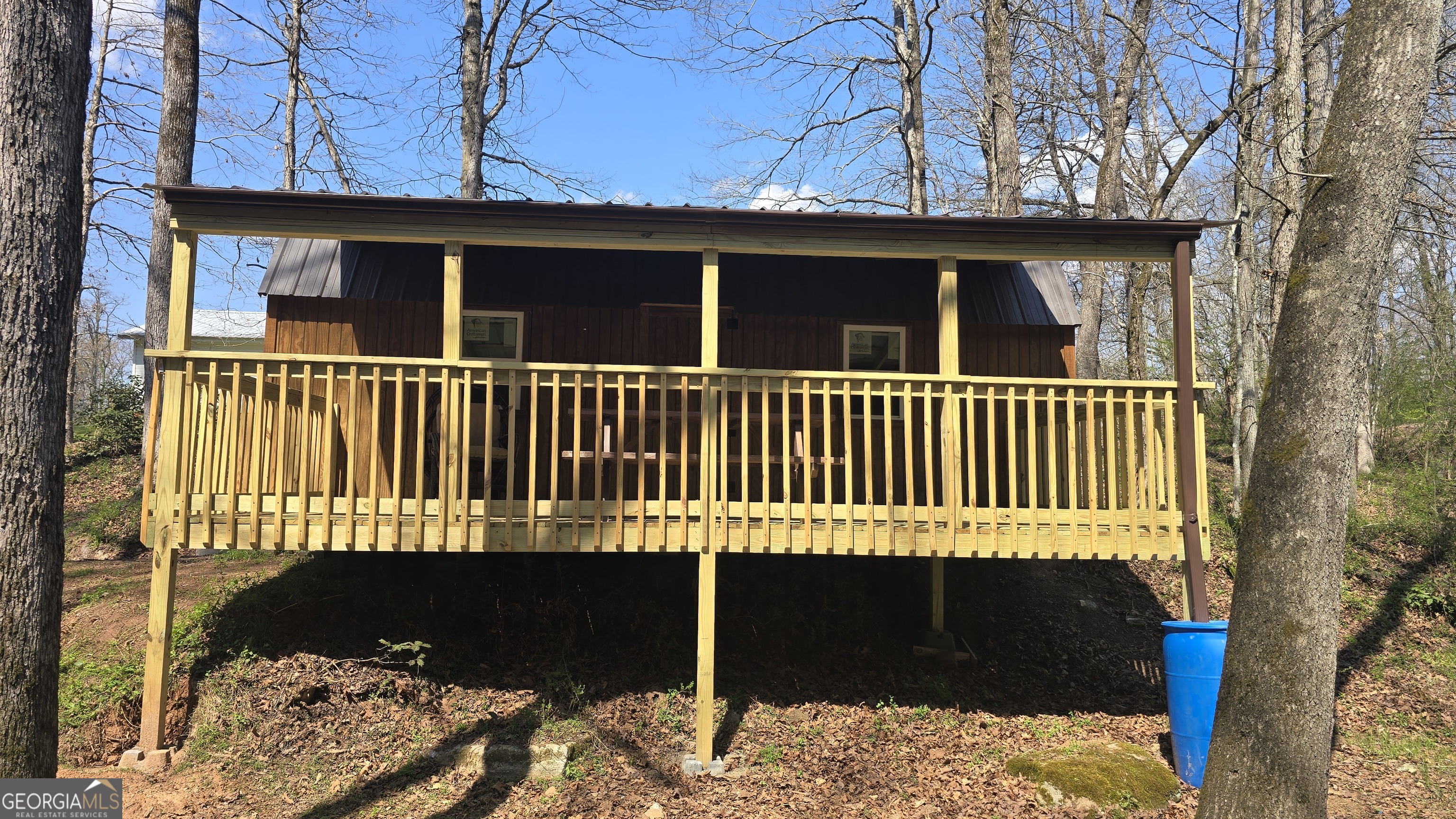0 Ray Palmer Road Cleveland, GA 30528 - Photo 5 of 20 a view of a house with a wooden fence