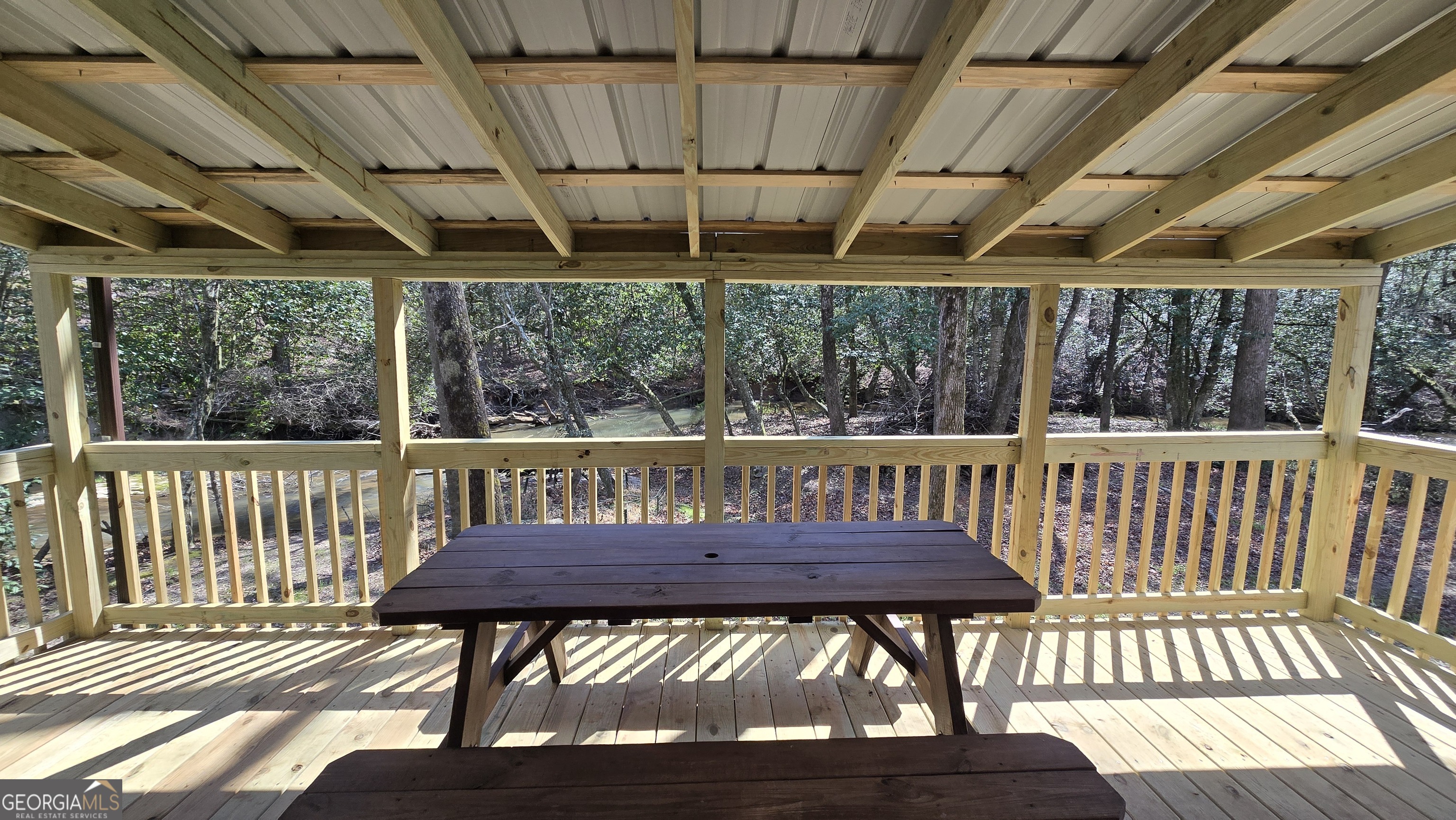0 Ray Palmer Road Cleveland, GA 30528 - Photo 6 of 20 a view of a wooden chairs on the roof deck