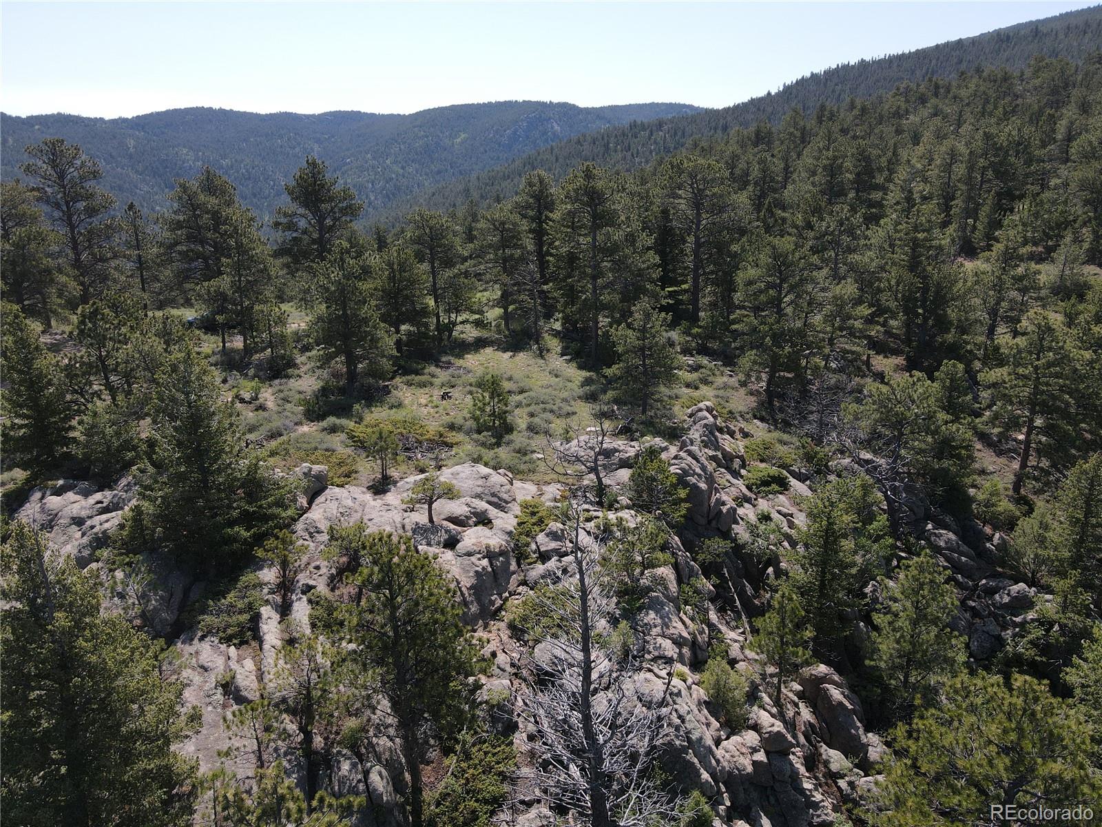 591599 Soul Shine Road Drake, CO 80515 - Photo 16 of 50 a view of a mountain in the distance