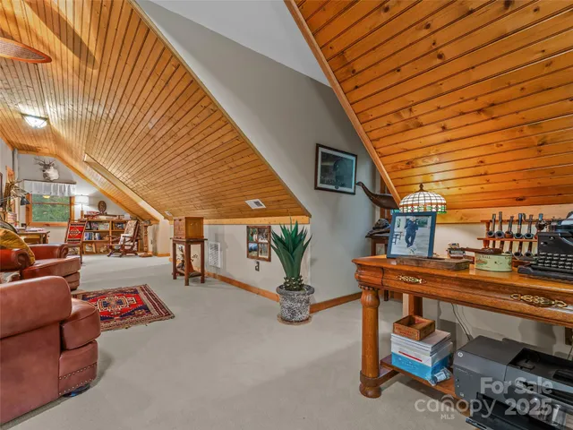 a view of a patio with table and chairs