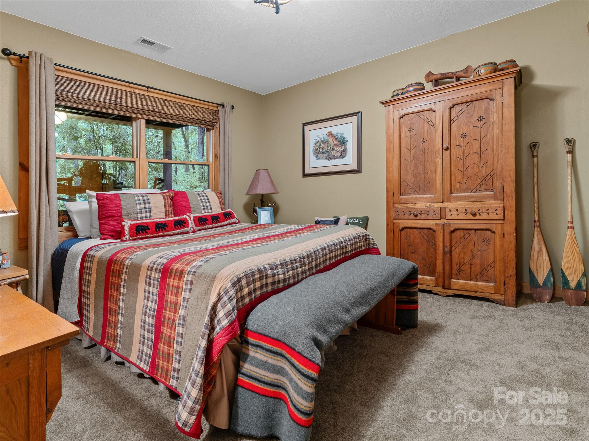 779 Thissa Way Brevard, NC 28712 - Photo 34 of 44 a bed room with a bed and a window