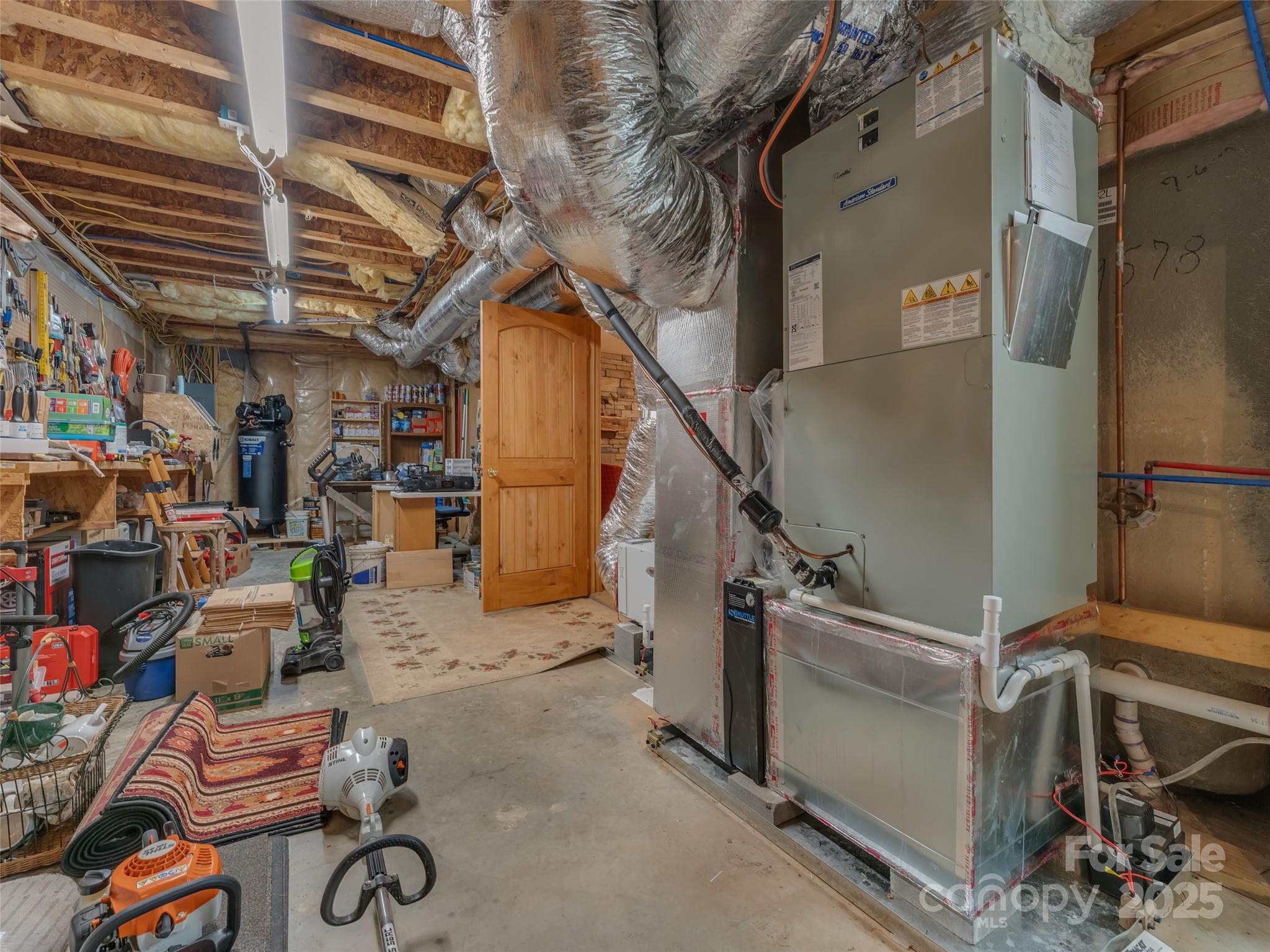 779 Thissa Way Brevard, NC 28712 - Photo 39 of 44 a view of storage and utility room