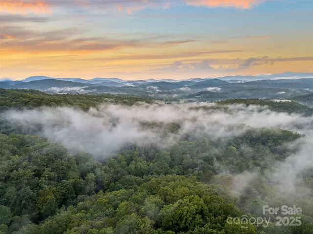 a view of lake with mountain