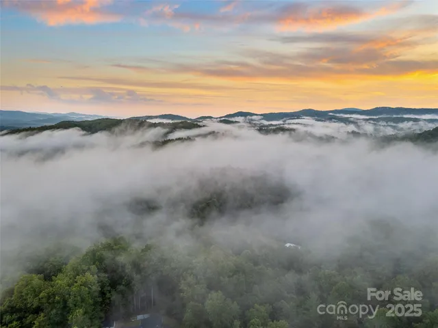 a view of lake with mountain