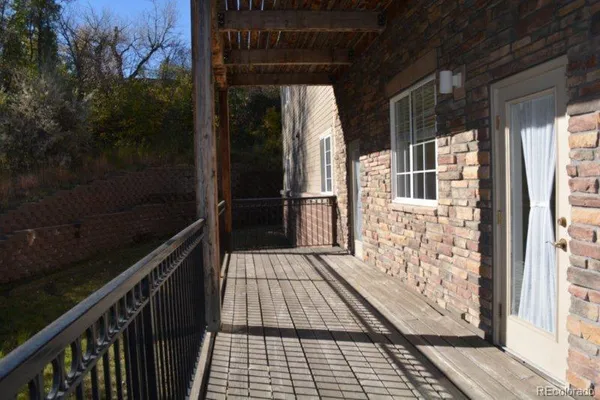 a bathroom with a glass shower door and a bathtub