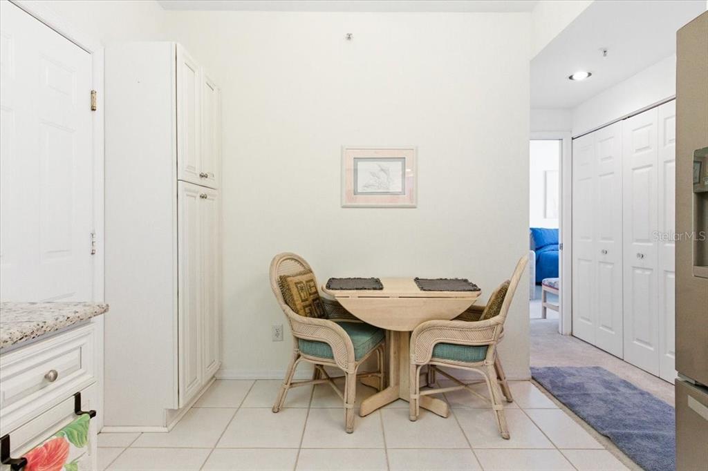 6640 Pineview Terrace, Unit 6640 Bradenton, FL 34203 - Photo 22 of 80 a view of a dining room with furniture